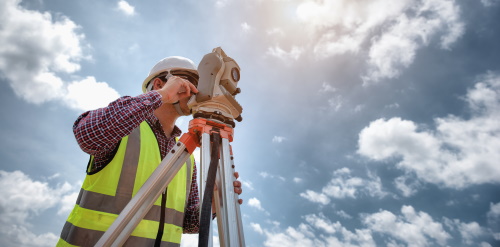 This image: an illustrative photo of a surveyor undertaking technical 
							work on site.
							The map: the map shows the Thrive site boundary.
